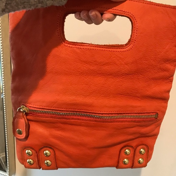 Handbags - Linea Pelle folding orange leather clutch